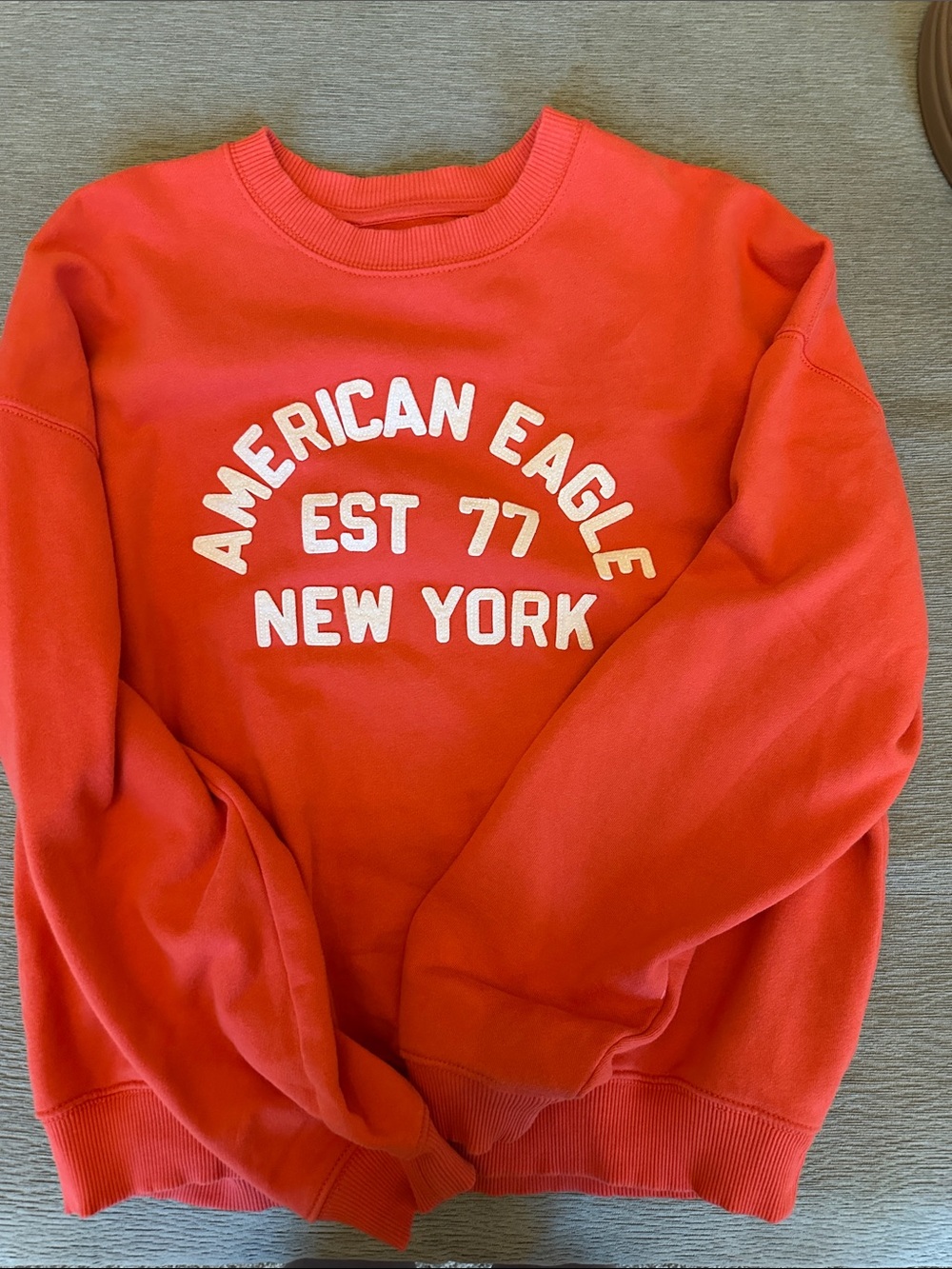 American Eagle Outfitters Coral-Red Crewneck with White Arch Logo